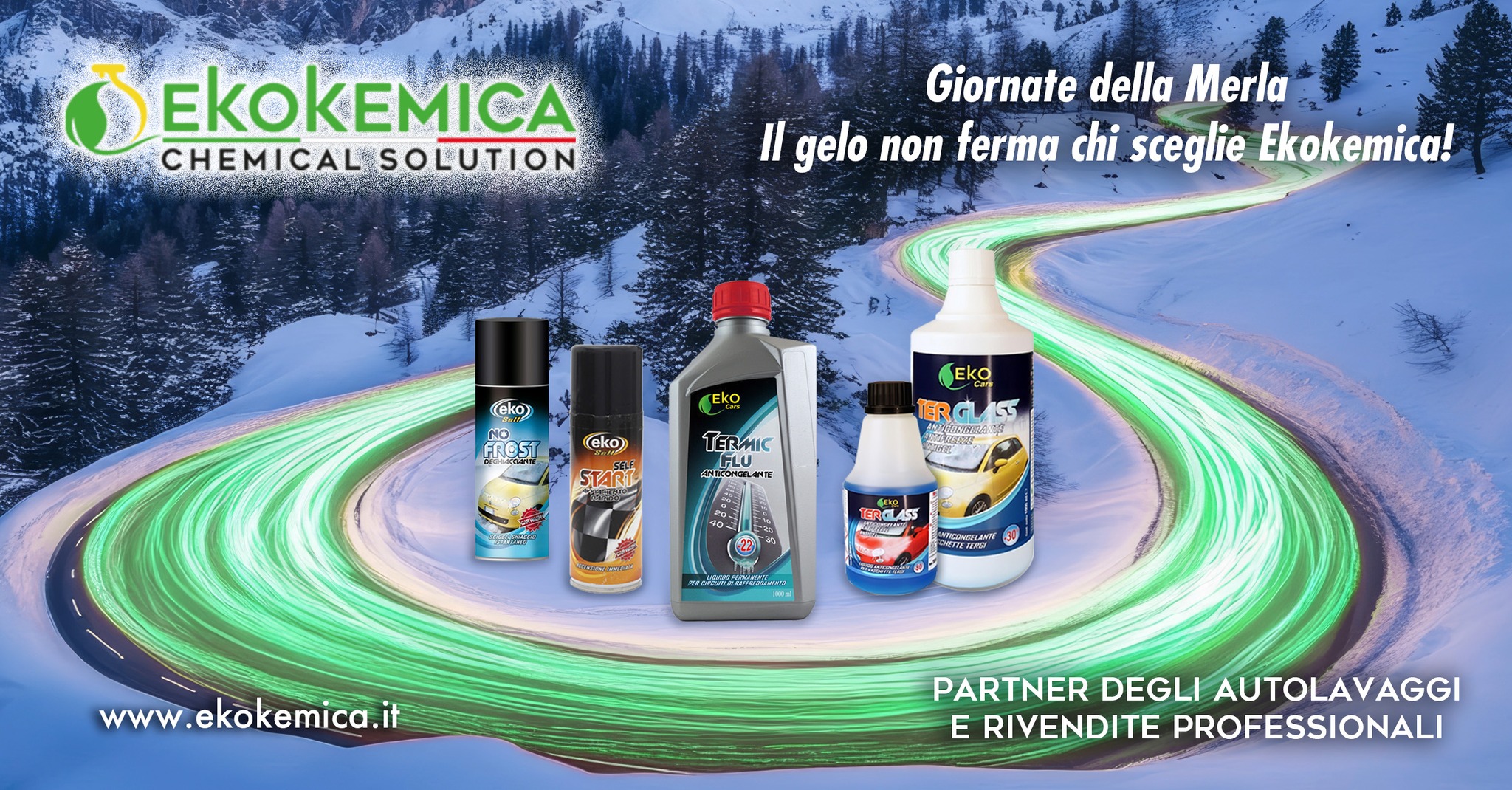 A red sports car driving through a snowy landscape.