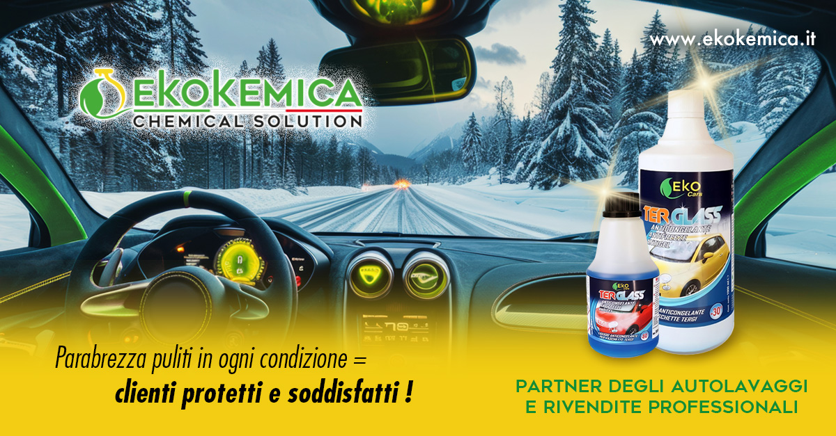 A red sports car driving through a snowy landscape.