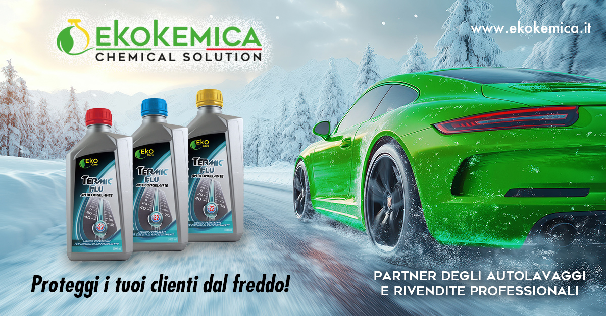 A red sports car driving through a snowy landscape.